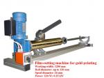 19. Machine for film-cutting for gold printing